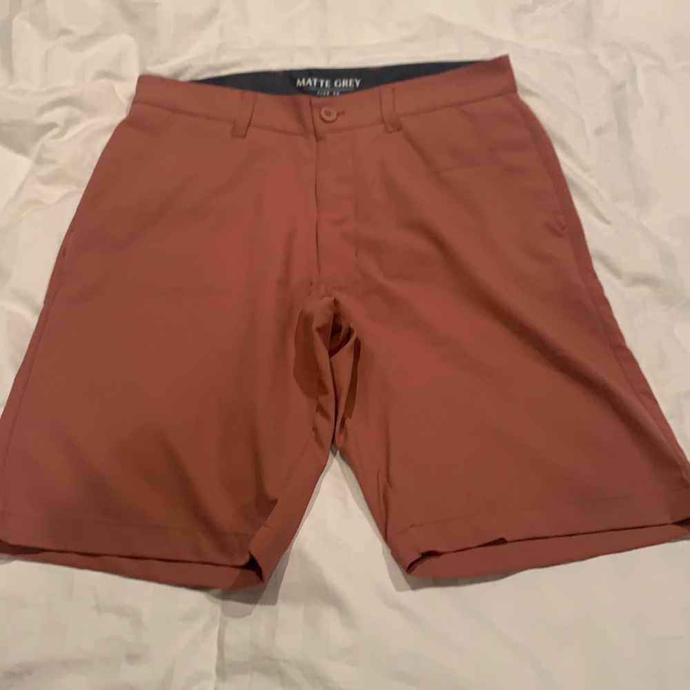 Men’s Red-rust colored, lightweight golf shorts